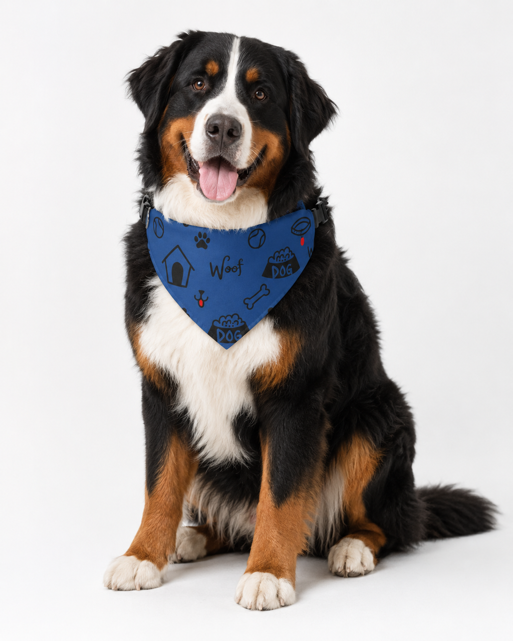 Dog wearing a blue bandana with paw prints and dog-themed designs on a white background