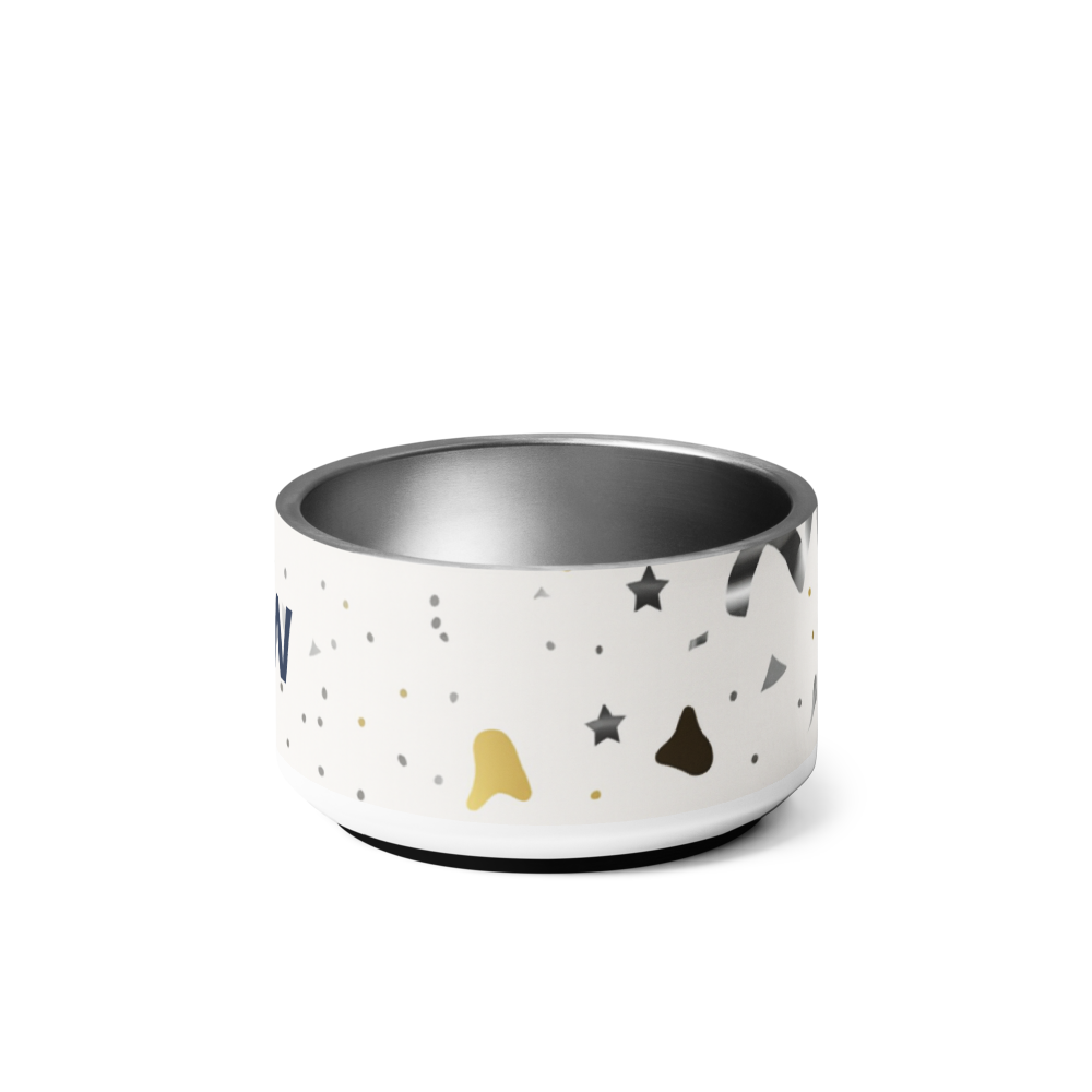 Ivory whisper bowl with black, gold, and gray star patterns on a white background