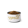 Ivory Whisper pet bowl with 'appétit' text filled with pet food on a Ivory background