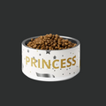 White bowl with 'PRINCESS' text filled with pet food on a black background