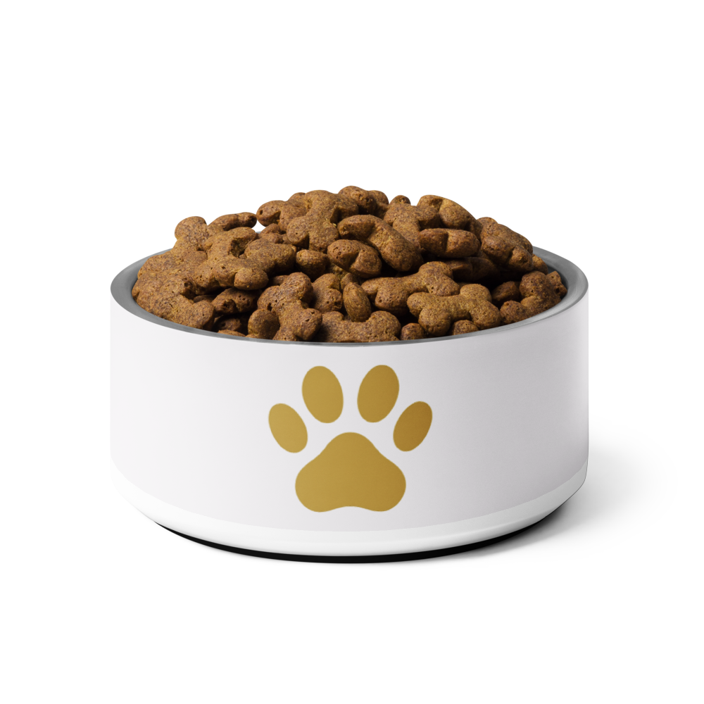 Ivory Whisper dog bowl with gold paw print and pet food on a white background