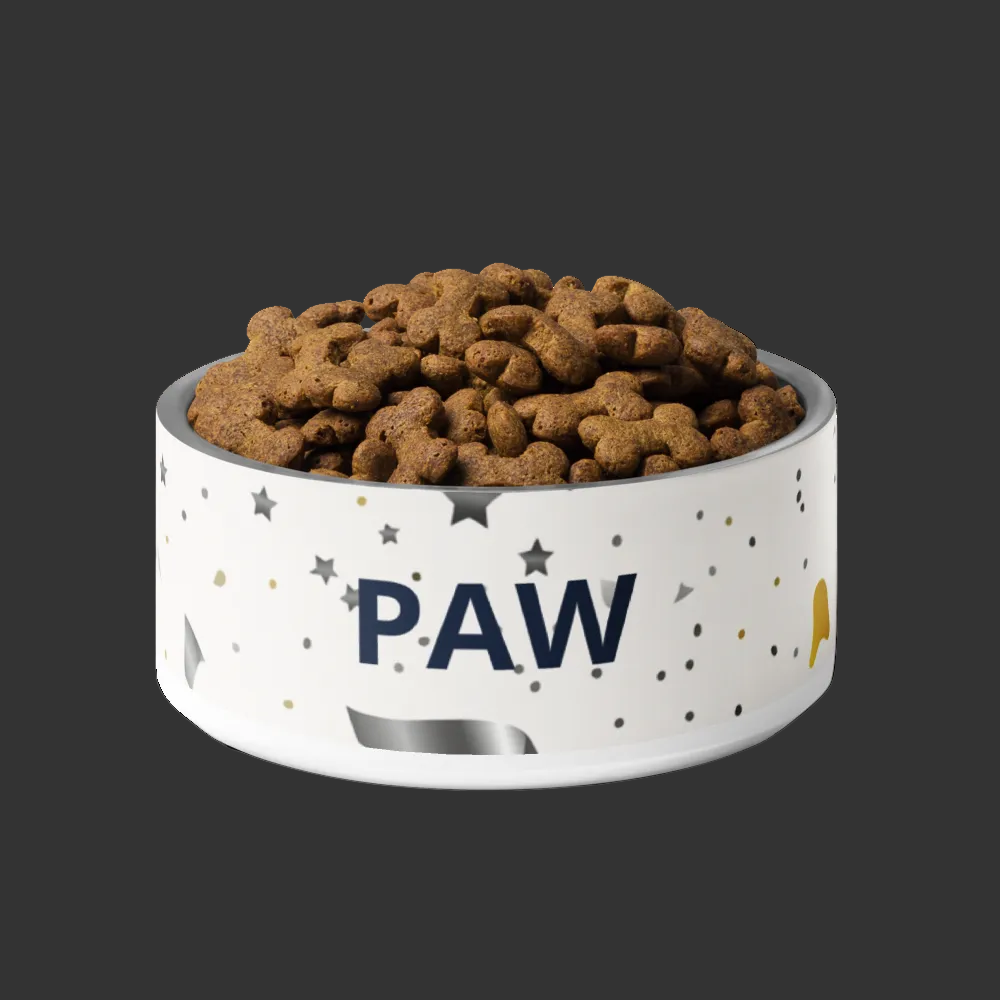 Ivory pet bowl with 'PAW' branding filled with dog food on a white background