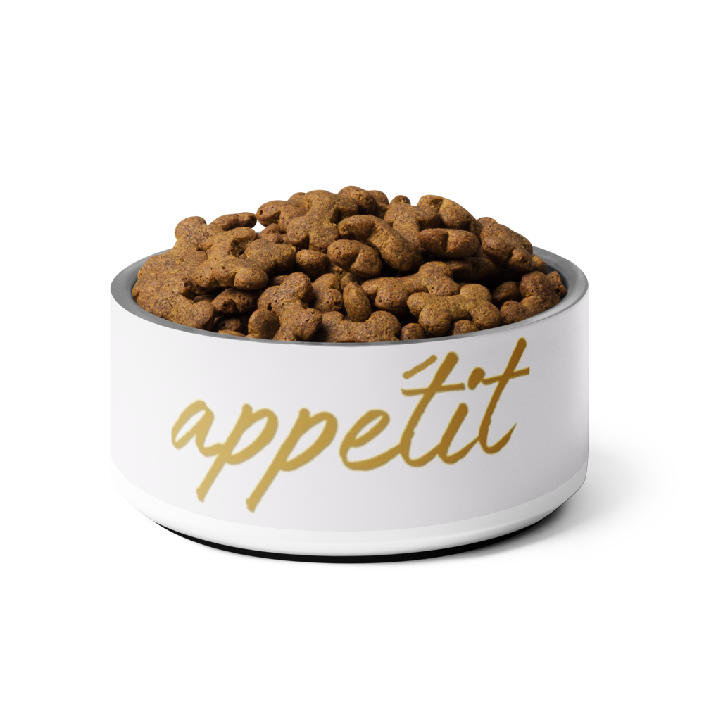 Ivory Whisper bowl with 'appetit' text filled with dog food on a Ivory  background