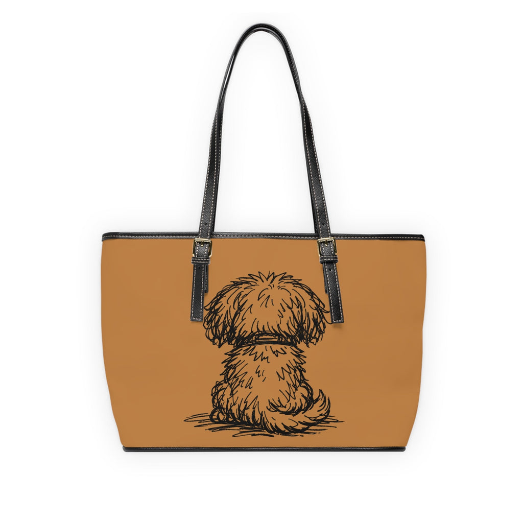 Tan tote bag with a dog illustration backside on a white background