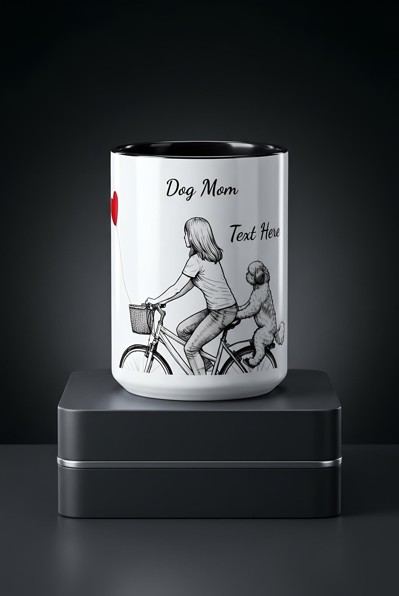 15 oz. Coffee mug with a design of a woman riding a bike with a dog in a basket, text 'Dog Mom Text Here', on a black background.