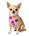 Personalized pink dog bandana with multi-colored frosted donuts pattern.