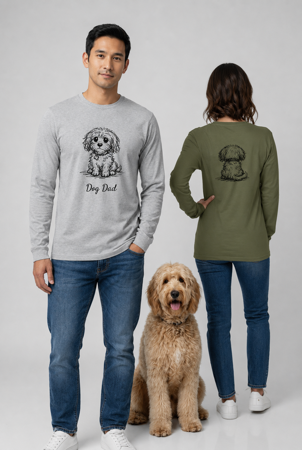 Two people wearing shirts with dog illustrations and a dog sitting between them on a plain background