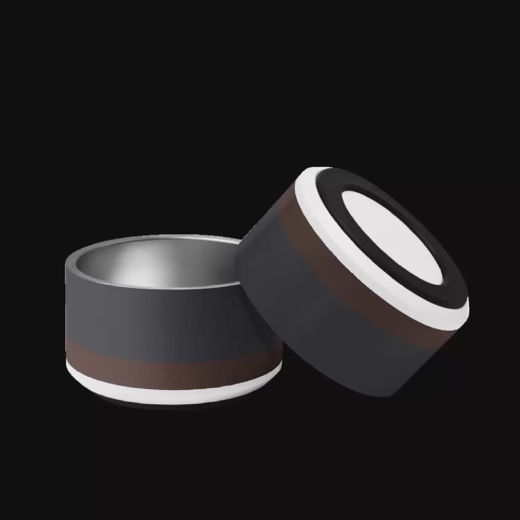 Video hand picks up stainless steel dog bowl to display beautiful interior and nonslip base