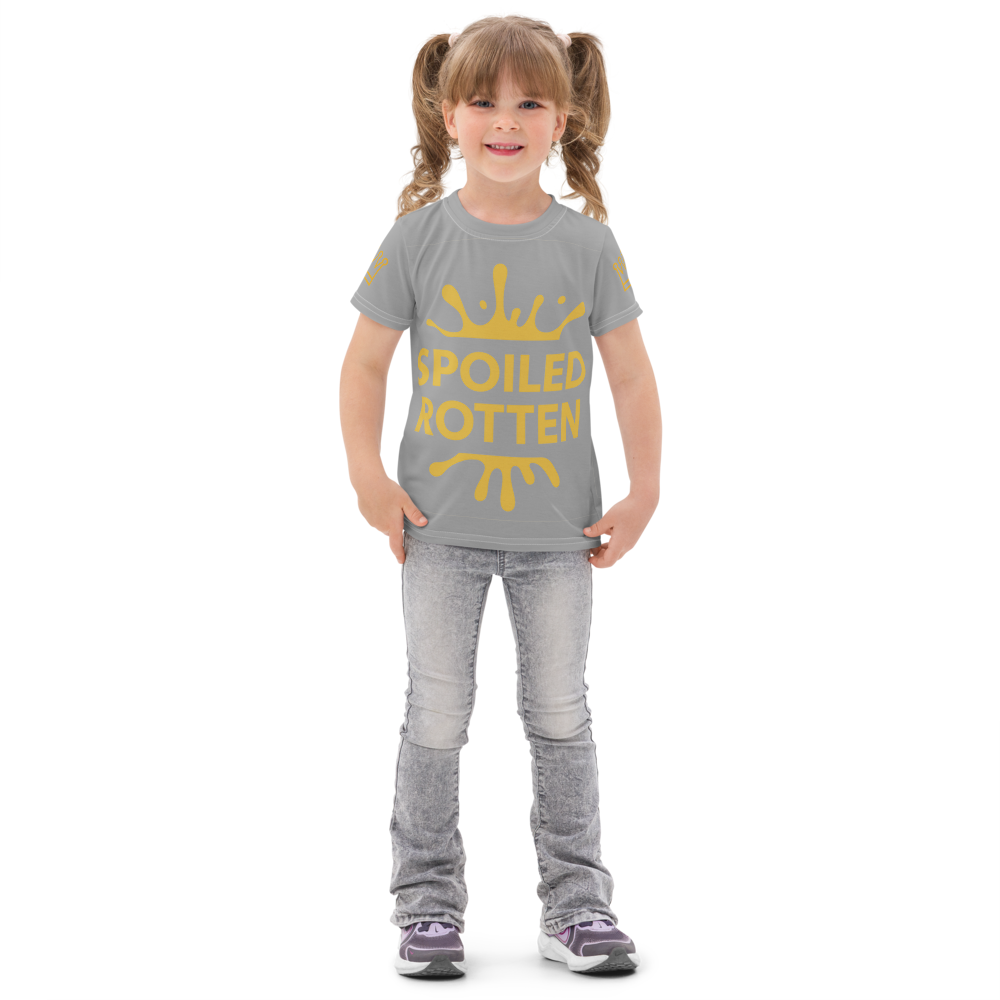 Child wearing a gray and gold t-shirt with 'Spoiled Rotten' text and a gold splash on a white background