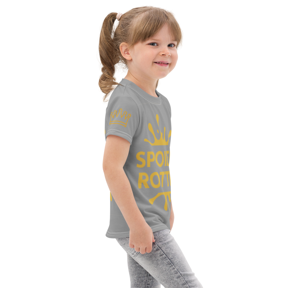 Child wearing a gray t-shirt with gold text and graphics that says Spoiled Rotten with a splash on the right side view 