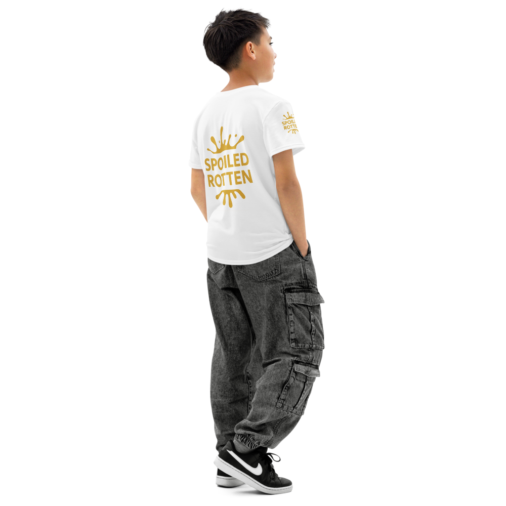 A teen model shown from the back all over print wearing a white t-shirt with a gold 'SPOILED ROTTEN' graphic, on a plain white background.