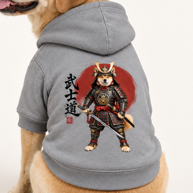 A close up image gray dog hoodie with a detailed samurai warrior graphic on the back, photographed against a clean white studio background.