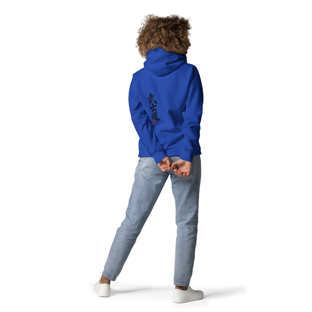 A woman shown from the back wearing a royal blue hoodie with black Japanese calligraphy on the back.